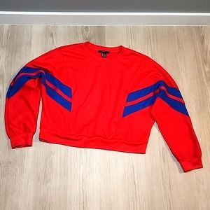 Forever 21 crop top sweatshirt. Bright red in color with blue stripes.